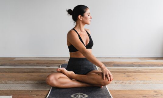 woman doing yoga and pilates